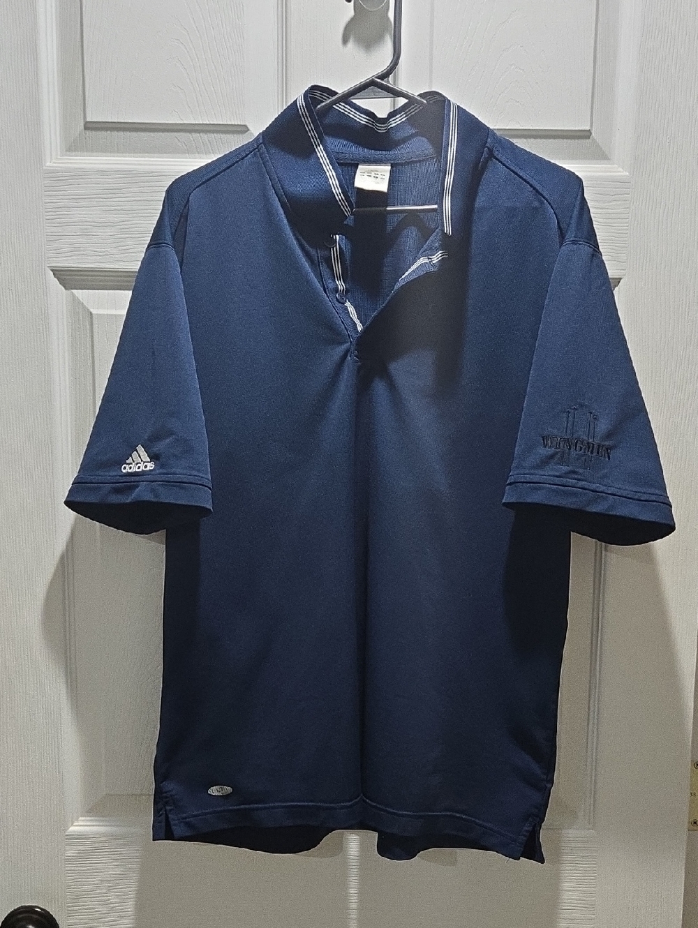 Adidas Navy Polo with White Logo And Wimgmen Logo. Size L.